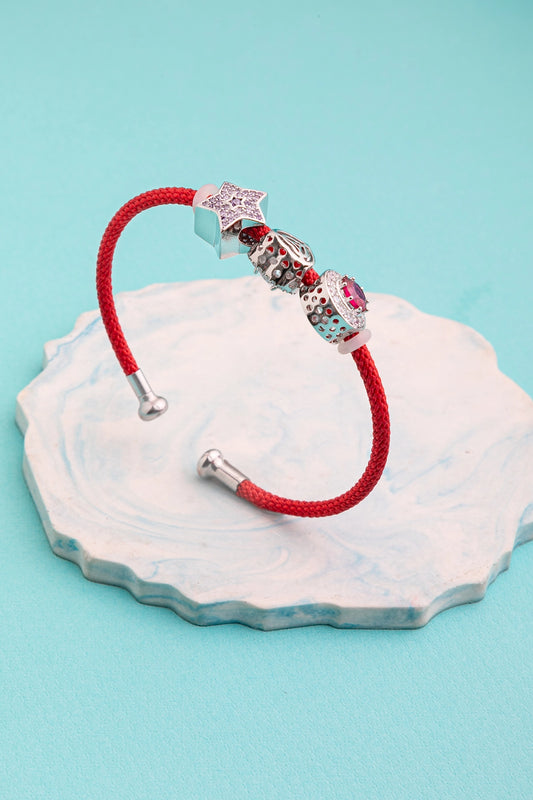 Different-Shaped Charms Fixed in a Stiff Kada White Rhodium Polish Flexible Elegant Jewellery (kada style)