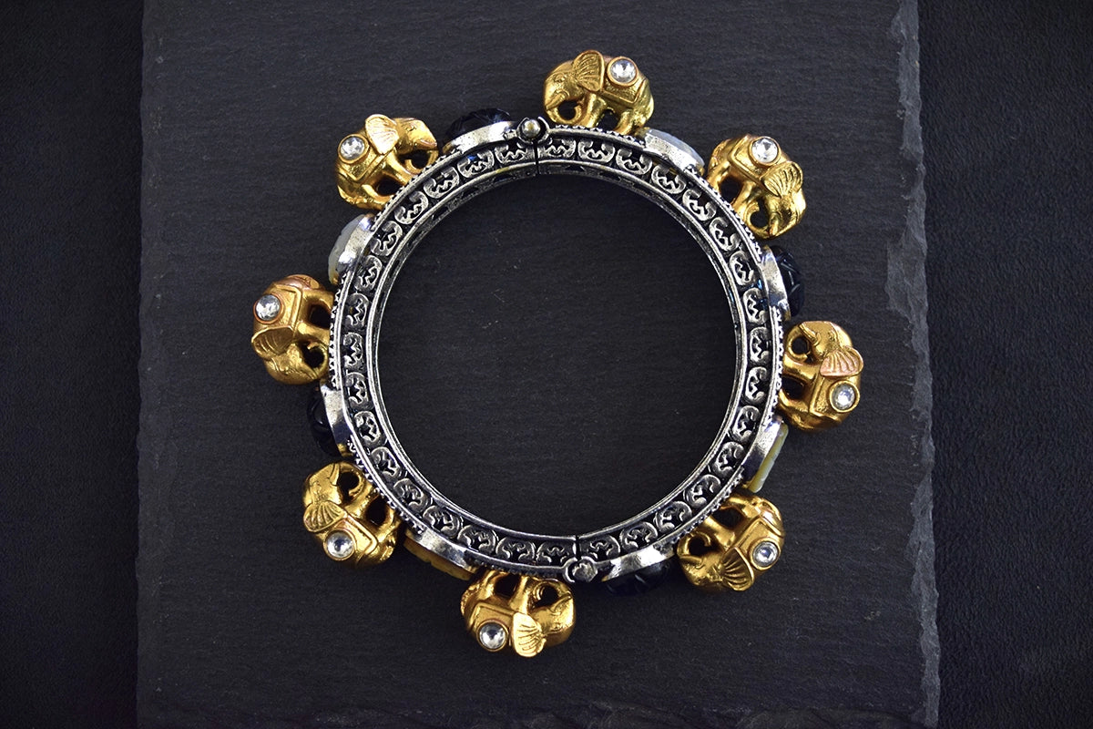 Elephant Bangle with Jadau Kundan, Carved MOP & Blue Stones  Silver Oxidized Polish  Openable  Size 2.6