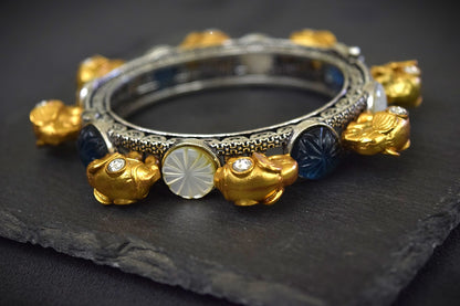 Elephant Bangle with Jadau Kundan, Carved MOP & Blue Stones  Silver Oxidized Polish  Openable  Size 2.6