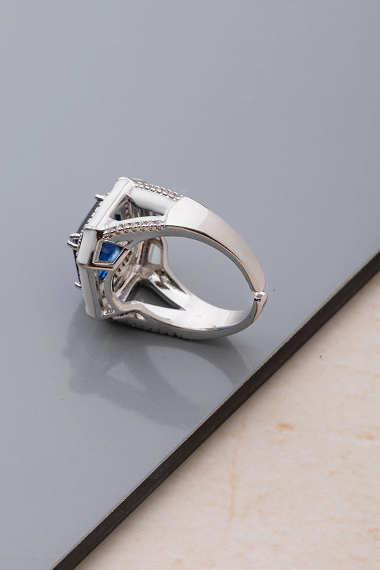White Enameled Ring with Blue Stone  White Rhodium Finish  Adjustable Size