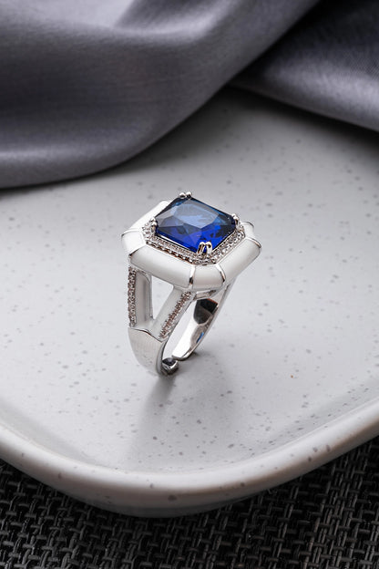 White Enameled Ring with Blue Stone  White Rhodium Finish  Adjustable Size
