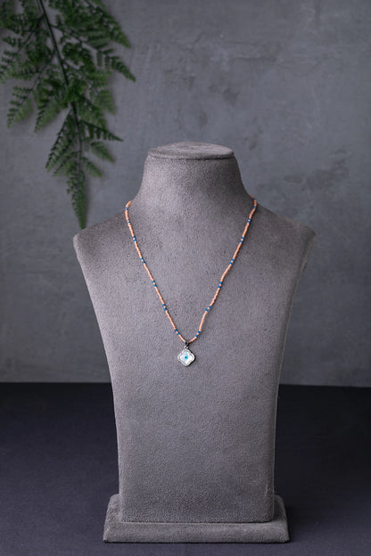 Evil Eye Pendant in Peach Crystal Beads with Blue Accents White Rhodium Finish Adjustable 18 Inches