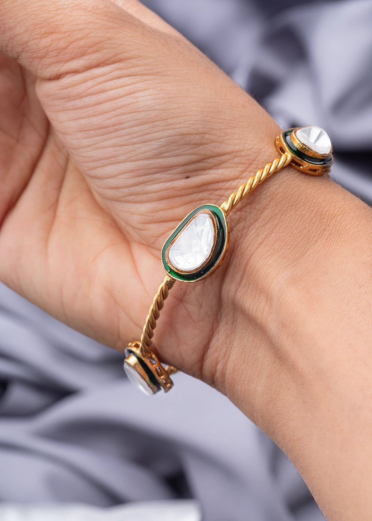 Contemporary Unshaped Kundan Bangle with Green Enameled Border  Matt Gold Finish  Non-Openable  Size 2.4