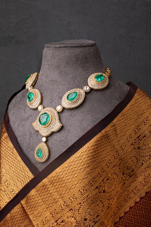 Indo-Western Long Necklace with Green Stone  Matt Gold Polish  18-Inch Adjustable Chain